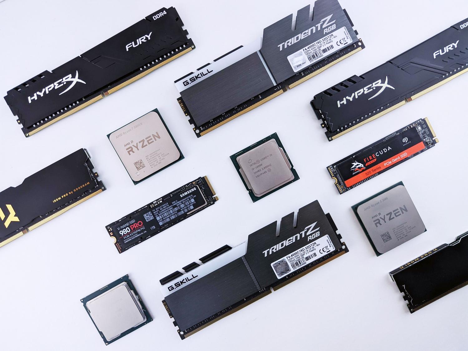 Studio shot of various computer RAM sticks and CPUs on a white background, representing memory upgrades.